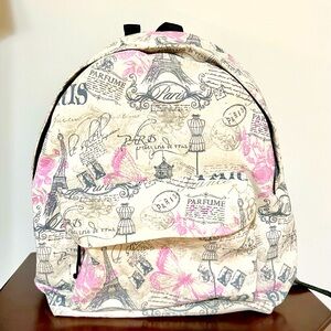 NWOT. Girls Paris Backpack. Never used. 16(tall) 13(long). Front extra zip pouch
